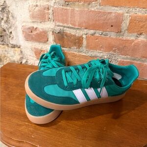 Adidas Green Sneakers with Purple Stripes
